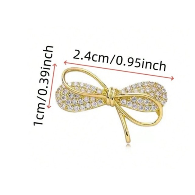 Mini broška zlate ali srebrne barve s pentljico