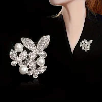 Elegantna luksuzna broška z metulji in perlami