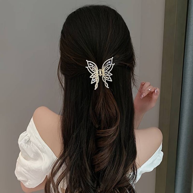 Kovinska sponka za lase z metuljčkom