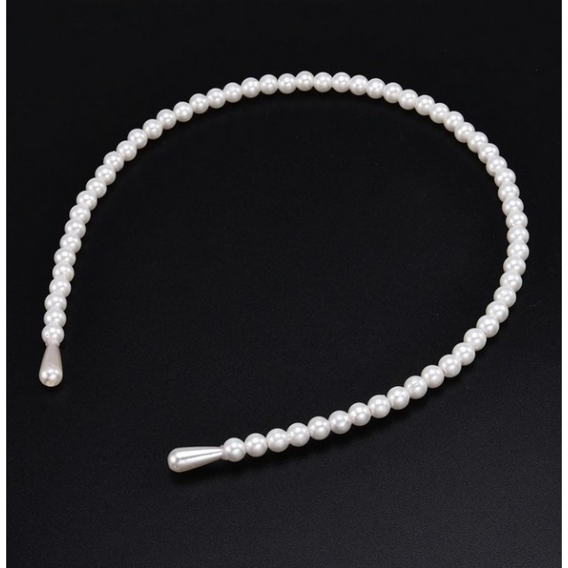 Obroč za lase iz manjših perlic, bele barve