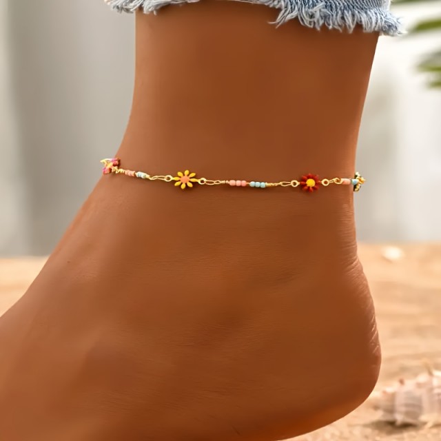 Barvita boho zapestnica za nogo z marjeticami 
