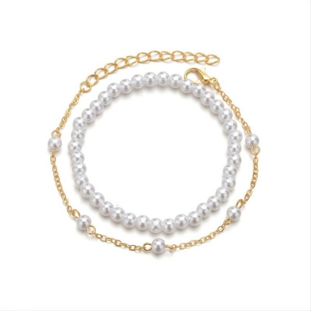 Set 2 zapestnic v belo-zlati barvi s perlicami